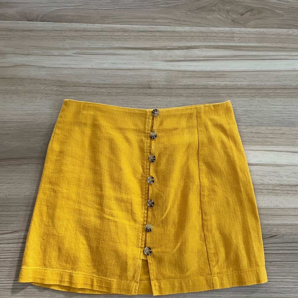 Forever 21 women’s mini button down skirt, size S. Mustard yellow